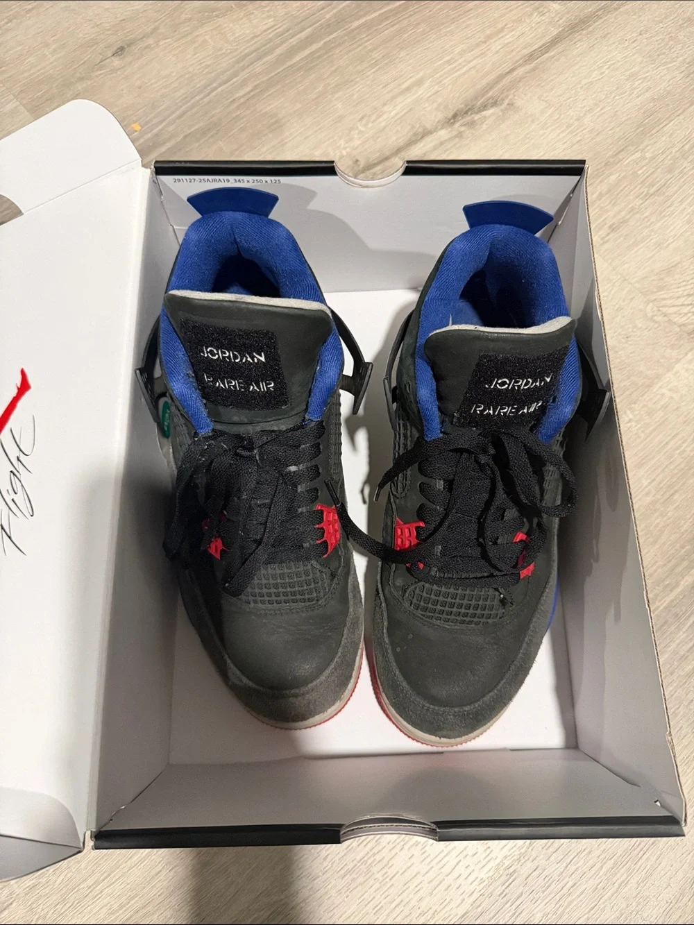 Jordan Men’s Black/Blue Basketball Sneakers with Red Accents
